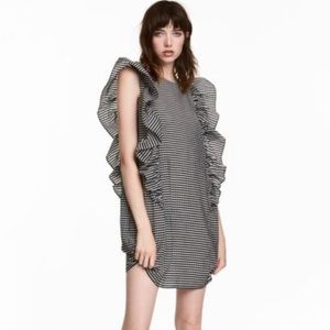 H&M black and white gingham mini ruffled dress in size 10. Great condition.